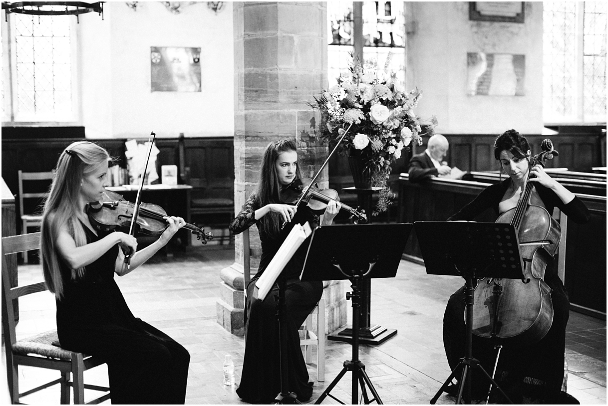 String quartet playing in church wedding