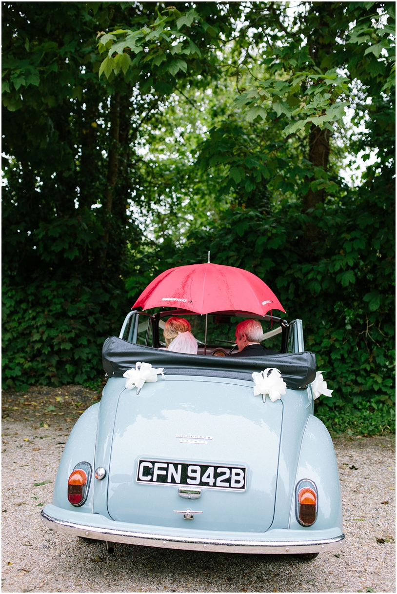 rainy-wedding-day-mini-wedding-car