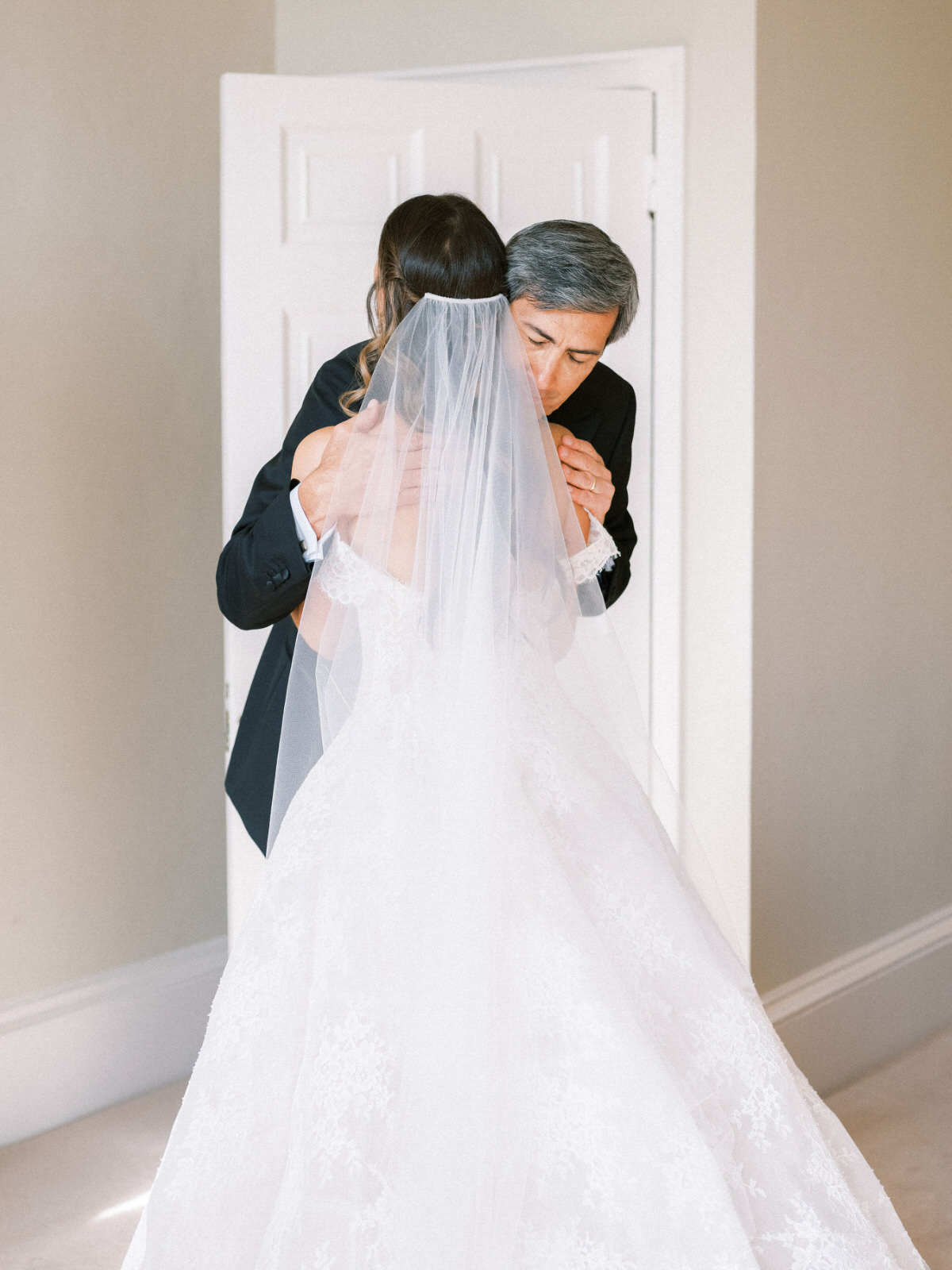 Father of the bride reaction captured by luxury wedding photographer 